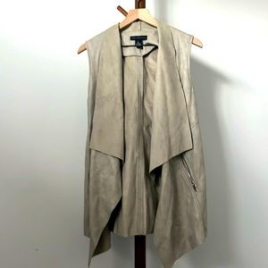100%polyester/shell backing- taupe brown color sleeveless faux suede vest.